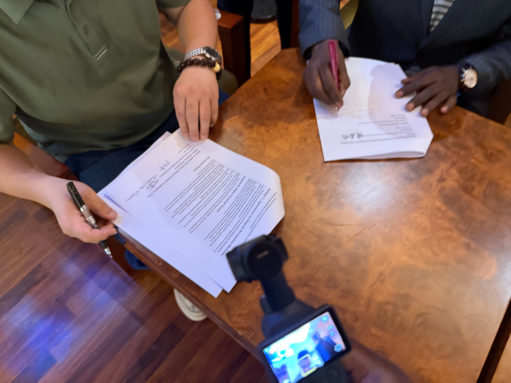 Close-Up of the Signing Session